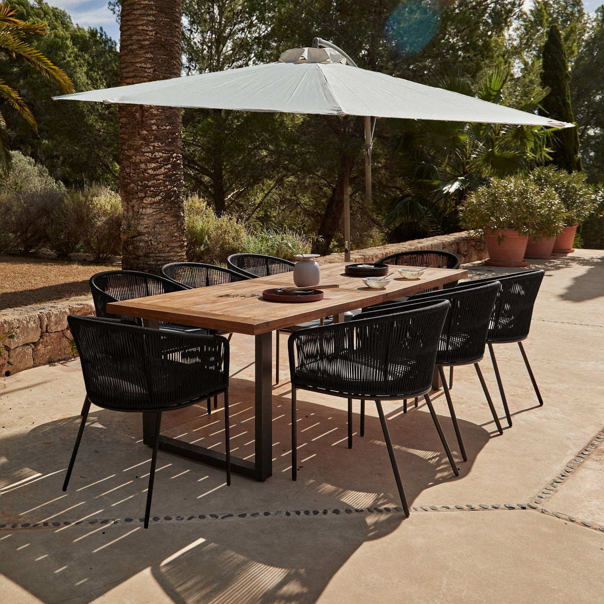 Hali 8 Seater Wooden Outdoor Dining Set with Hali Black Chairs & Cream Lean Over Parasol - 235cm