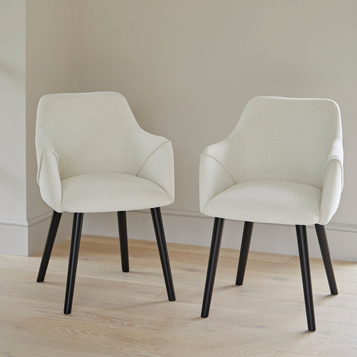 Freya Boucle Armchairs with Black Legs
 - Laura James 