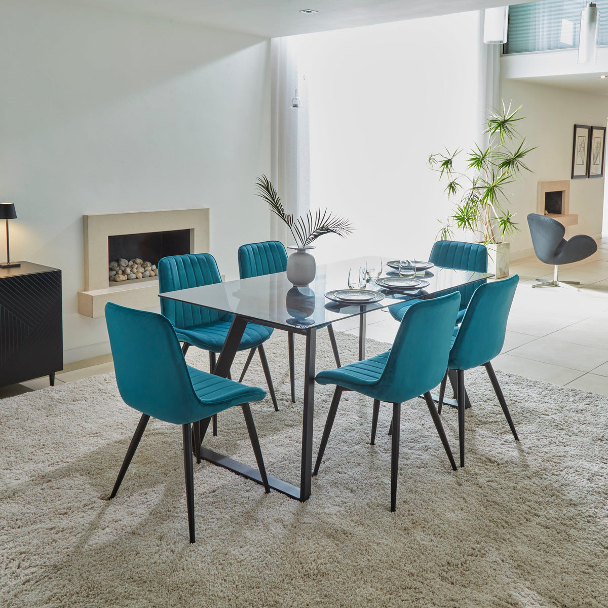 Atlas Smoked Glass dining table - with metal legs - Laura James