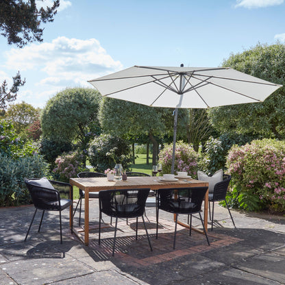Lennox Table With 6 Hali Black Dining Chairs and Cream Lean Over Parasol