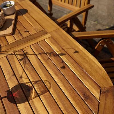 Oakley 4 Seater Wooden Extendable Round Garden Dining Table with 4 Rattan Dining Chairs - Laura James