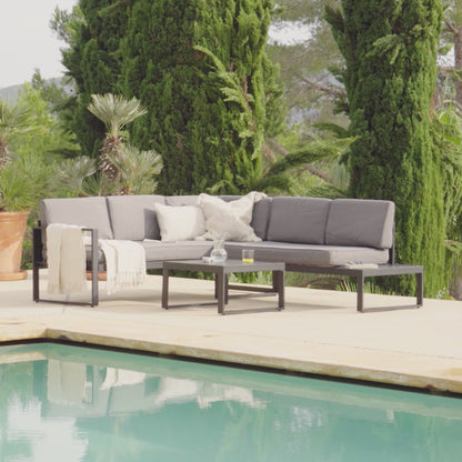 Maia Garden Corner Sofa - Black - Left Hand Assembly - Cream Lean Over Parasol